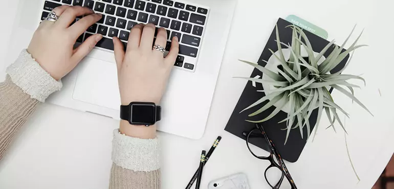 top down view of typing person